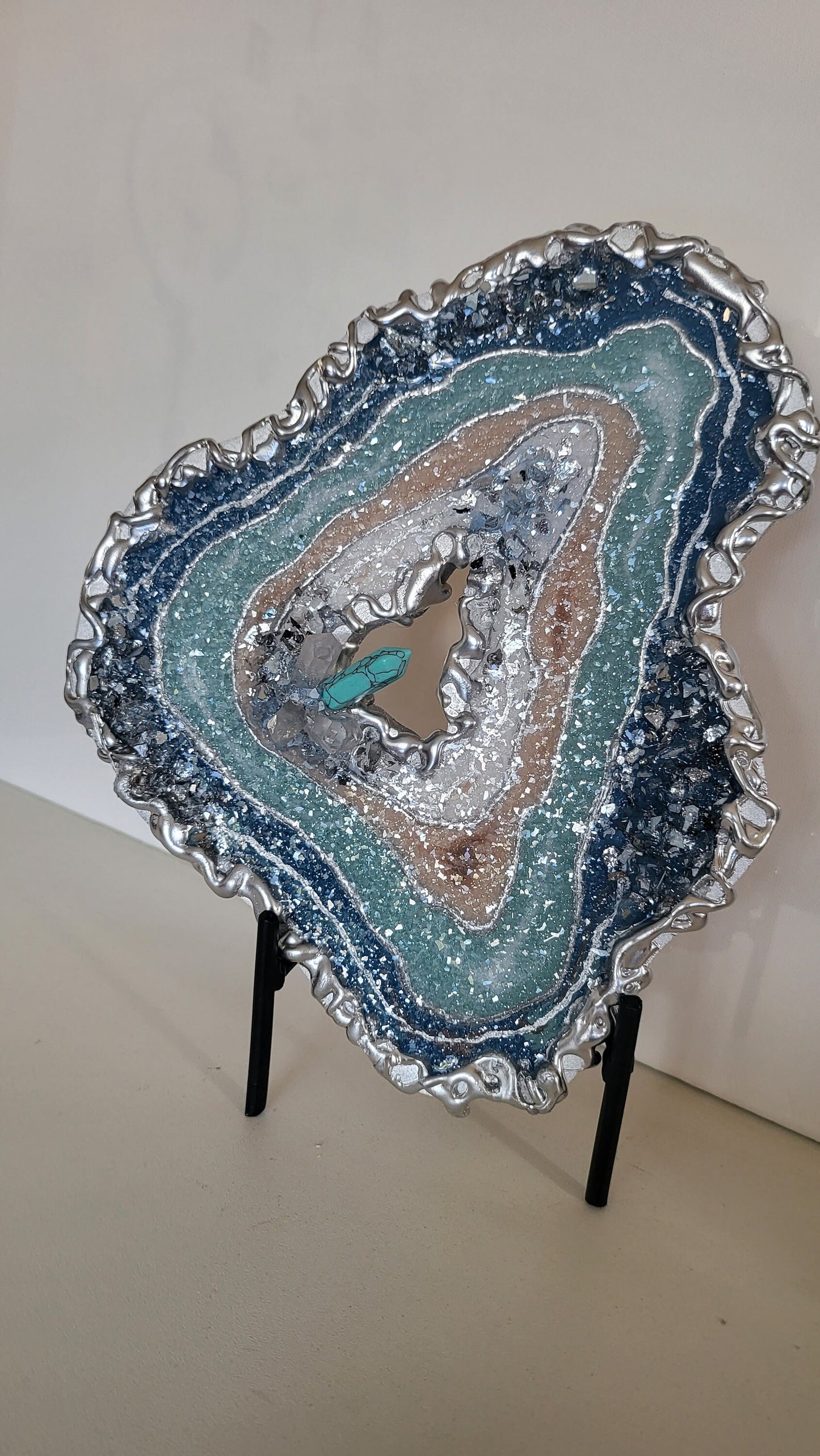 Mini geode for wallart or table top decor with quartz crystals and turquoise. 8"×7.5" comes with no stand