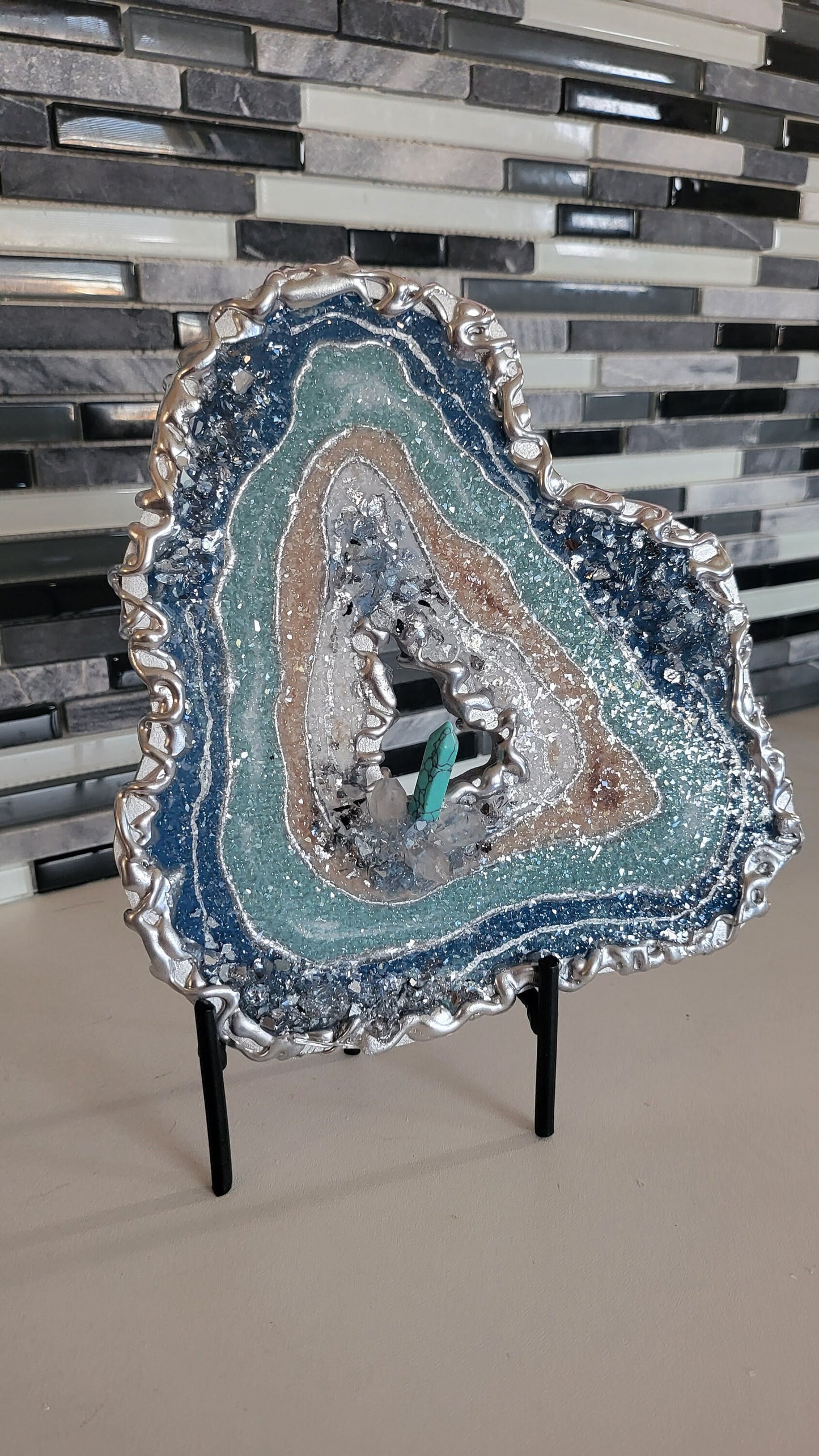 Mini geode for wallart or table top decor with quartz crystals and turquoise. 8"×7.5" comes with no stand
