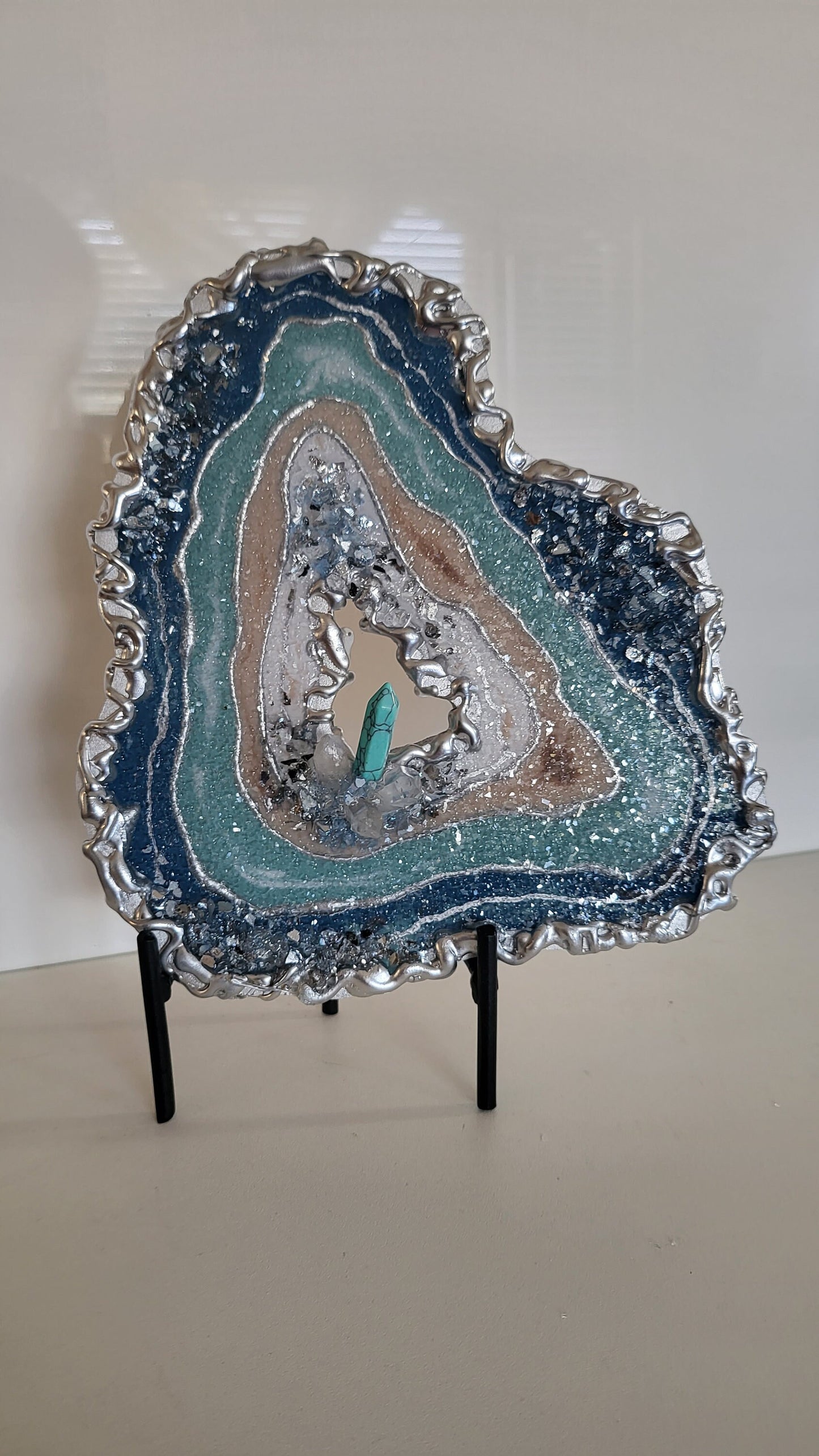Mini geode for wallart or table top decor with quartz crystals and turquoise. 8"×7.5" comes with no stand