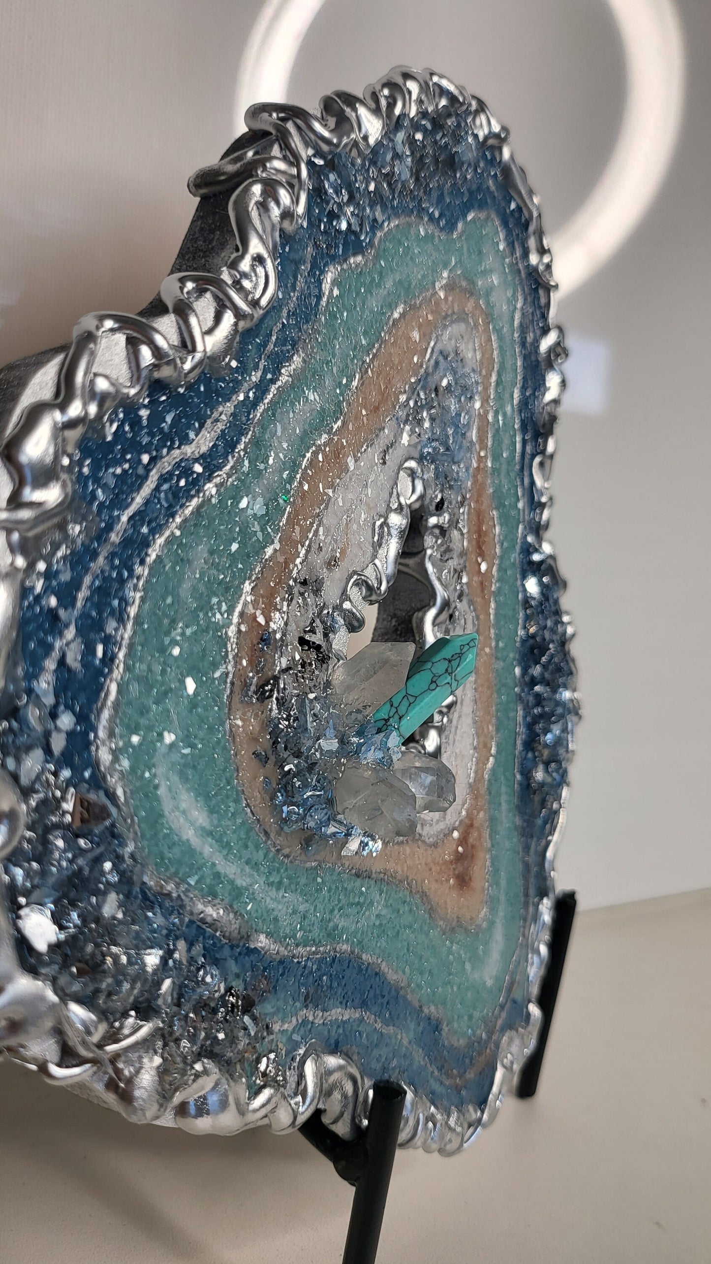 Mini geode for wallart or table top decor with quartz crystals and turquoise. 8"×7.5" comes with no stand