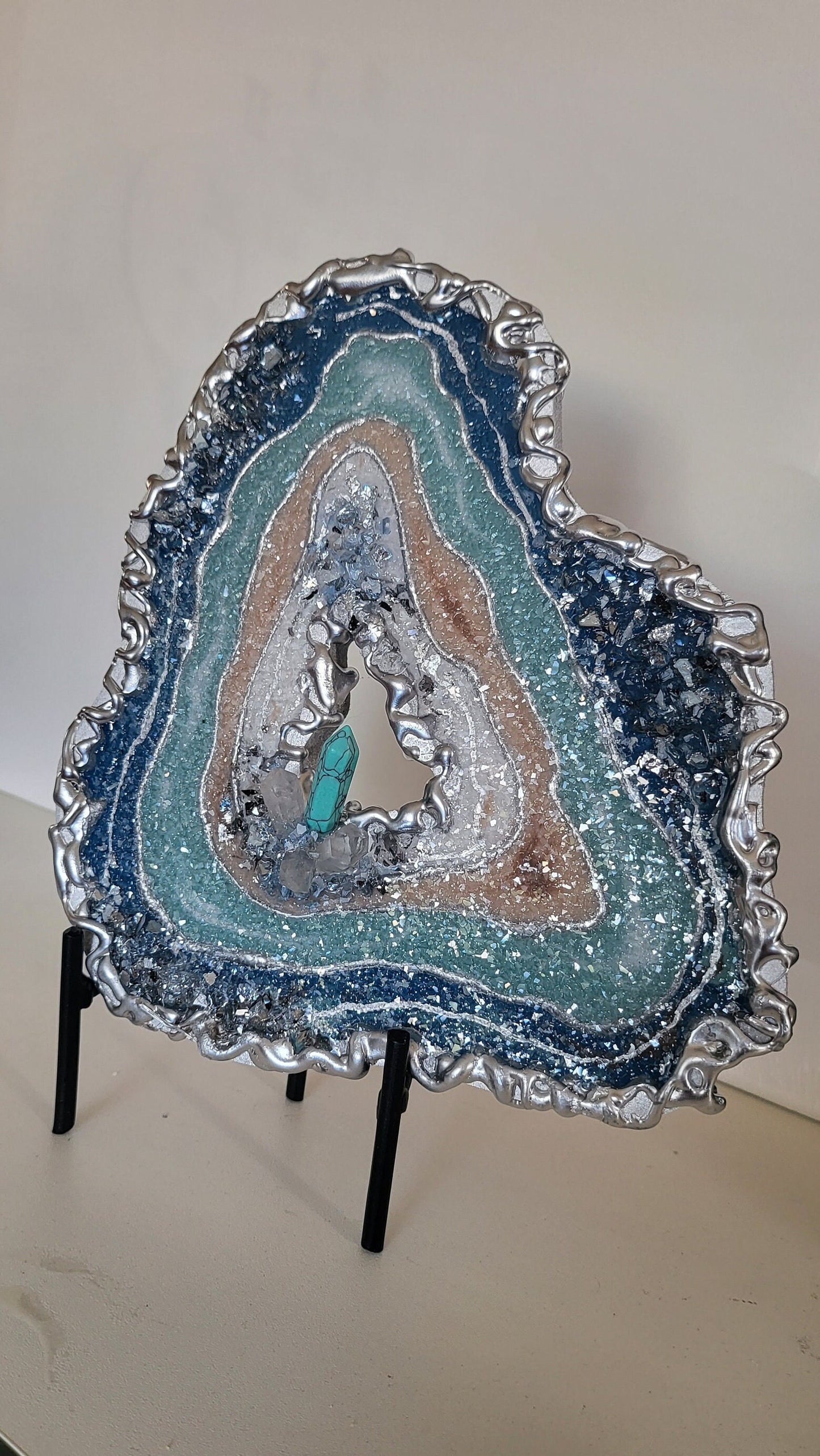 Mini geode for wallart or table top decor with quartz crystals and turquoise. 8"×7.5" comes with no stand